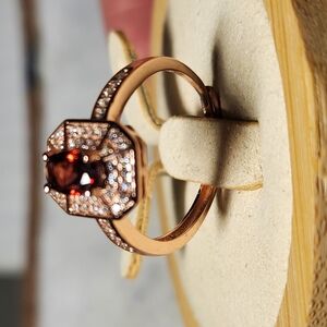 Elegant Rose Gold Ring with Red Garnet